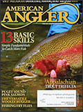 american angler magazine cover with man holding trout